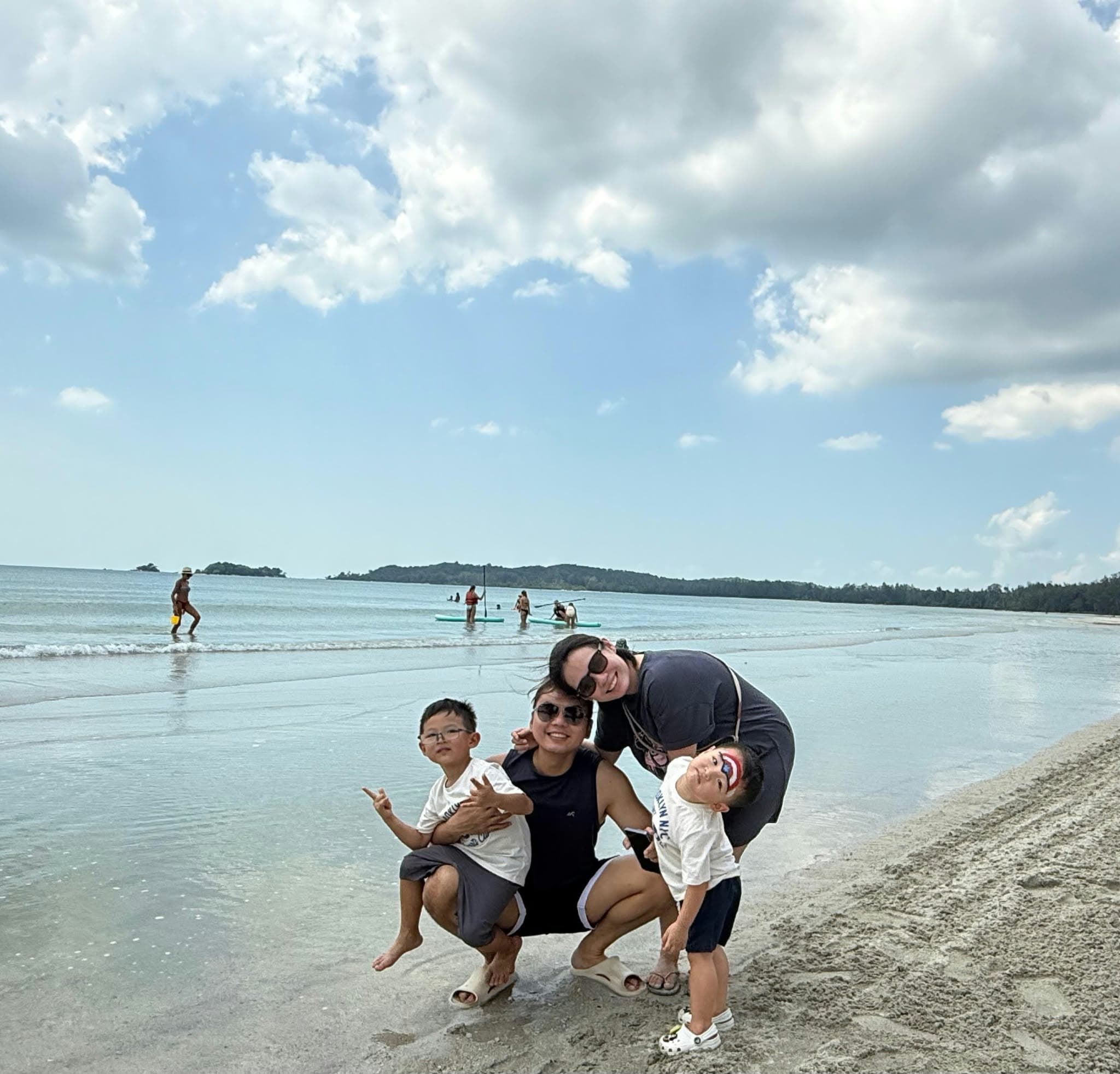 Leonard, Joanna, Lucas and Ethan together on a beach