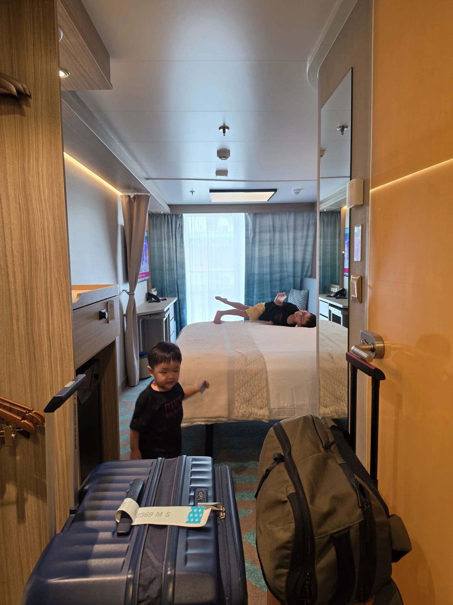 Lucas and Ethan exploring our stateroom.