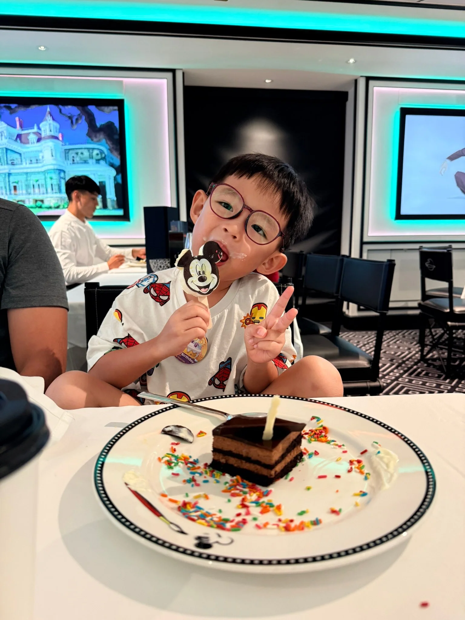 Lucas with his birthday cake and a Mickey cookie at Animator’s Palate.