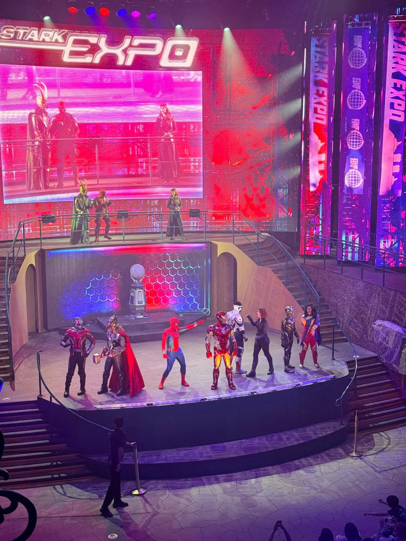 The Avengers Assemble cast on Garden Stage at night.